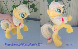 Size: 1600x1014 | Tagged: safe, artist:epicrainbowcrafts, applejack, g4, hand, irl, photo, plushie, posable, rearing, solo