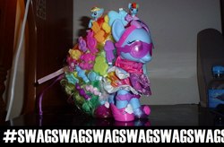 Size: 960x630 | Tagged: safe, rainbow dash, g4, clusterfuck, dashstorm, female, hashtag, irl, multeity, photo, rainbow dash always dresses in style, swag, this isn't even my final form, toy