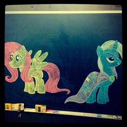 Size: 612x612 | Tagged: safe, fluttershy, trixie, g4, chalk, chalk drawing, chalkboard, photo, the hub, traditional art