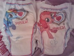 Size: 700x525 | Tagged: safe, pinkie pie, rainbow dash, earth pony, pegasus, pony, g4, diaper, heart, irl, merchandise, photo, pinkie pie's cutie mark, pullup (diaper), rainbow dash's cutie mark, walgreens