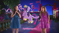 Size: 960x540 | Tagged: safe, screencap, twilight sparkle, alicorn, human, g4, official, big crown thingy, commercial, crystal princess celebration, element of magic, irl, irl human, let's fly to the castle, lidded eyes, photo, ponies in real life, twilight sparkle (alicorn), url