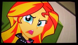 Size: 1016x594 | Tagged: safe, screencap, sunset shimmer, equestria girls, g4, my little pony equestria girls, faic, female, photo, picture of a screen, solo, stare