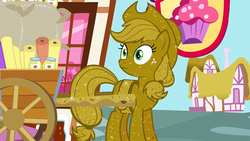 Size: 640x360 | Tagged: safe, screencap, applejack, earth pony, pony, apple family reunion, g4, cart, female, glitter, golden applejack, luster dust, mare, ponyville, shiny, solo, sugarcube corner, surprised, wide eyes