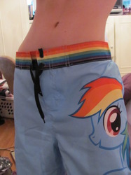 Size: 1280x1707 | Tagged: safe, rainbow dash, human, g4, apparel, belly button, clothes, irl, irl human, merchandise, photo, shorts, solo