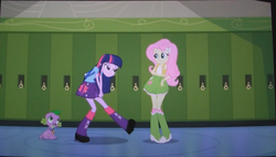 Size: 1445x819 | Tagged: safe, screencap, fluttershy, spike, twilight sparkle, dog, equestria girls, g4, my little pony equestria girls, backpack, boots, clothes, high heel boots, lockers, out of context, photo, picture of a screen, skirt, socks, spike the dog