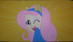 Size: 1413x827 | Tagged: safe, screencap, fluttershy, equestria girls, g4, my little pony equestria girls, female, helping twilight win the crown, solo, wink, wondercolts