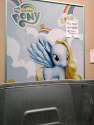 Size: 1944x2592 | Tagged: safe, derpy hooves, pegasus, pony, g4, comic con, fashion style, female, figurine, irl, mare, photo, poster, solo, toy