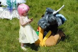 Size: 1280x857 | Tagged: safe, discord, fluttershy, human, g4, colossalcon, convention, cosplay, fursuit, irl, irl human, photo