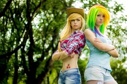 Size: 740x493 | Tagged: safe, applejack, rainbow dash, human, g4, belly button, cosplay, irl, irl human, midriff, photo