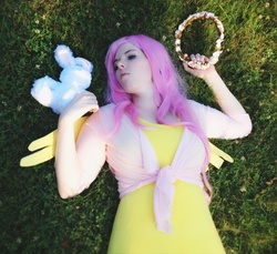 Size: 559x512 | Tagged: safe, artist:mintyblitzz, angel bunny, fluttershy, human, g4, cosplay, female, flower, irl, irl human, photo, solo