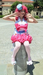 Size: 433x750 | Tagged: safe, artist:nichichan, pinkie pie, human, g4, bow, clothes, cosplay, dress, fanimecon, gala dress, irl, irl human, pantyhose, photo, solo