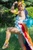 Size: 683x1024 | Tagged: safe, artist:intolerance90, rainbow dash, human, g4, action pose, clothes, cosplay, dokomi, dress, gala dress, irl, irl human, photo, solo