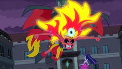 Size: 1023x576 | Tagged: safe, screencap, sunset shimmer, twilight sparkle, demon, human, equestria girls, g4, my little pony equestria girls, angry, big crown thingy, duo, duo female, fall formal outfits, female, fiery shimmer, fist, flying, mane of fire, size difference, sunset satan, windswept mane