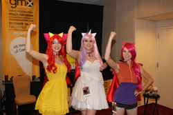 Size: 1023x682 | Tagged: safe, artist:rougeleaderred, apple bloom, scootaloo, sweetie belle, human, g4, armpits, cape, clothes, cosplay, cutie mark crusaders, dragon con, dragoncon 2012, irl, irl human, photo