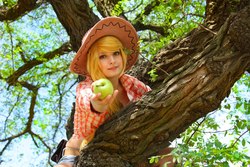 Size: 1000x667 | Tagged: safe, artist:evil--cupcake, applejack, human, g4, apple, cosplay, irl, irl human, obligatory apple, photo, solo, tree