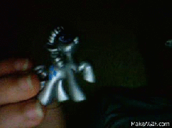 Size: 320x240 | Tagged: safe, rarity, g4, animated, blind bag, irl, photo, silver, toy