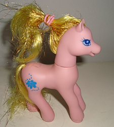 Size: 496x550 | Tagged: safe, lady elegant, earth pony, pony, g2, female, irl, mare, nobility, photo, ponytail, smiling, solo, tail, toy