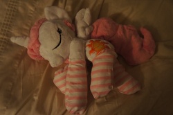 Size: 4592x3056 | Tagged: safe, artist:jessikitt-e, princess celestia, g4, clothes, irl, photo, plushie, sleeping, socks, striped socks