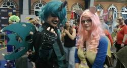 Size: 758x406 | Tagged: safe, artist:arksangel101, fluttershy, queen chrysalis, human, g4, cosplay, irl, irl human, king metamorphosis, london mcm expo, manchester expo, mcm comic con, photo, rule 63