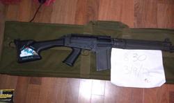 Size: 800x478 | Tagged: safe, rainbow dash, g4, customized toy, fn fal, gun, gunified, irl, my little arsenal, photo, rifle