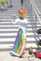 Size: 2304x3456 | Tagged: safe, artist:hybridrain, rainbow dash, human, g4, action pose, anime expo, clothes, cosplay, day, dress, gala dress, irl, irl human, photo, solo