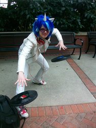 Size: 2304x3072 | Tagged: safe, artist:meevist, dj pon-3, vinyl scratch, human, g4, bench, clothes, cosplay, costume, headphones, irl, irl human, katsucon, katsucon 2013, photo, record, records, shoes, sneakers, solo