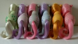 Size: 800x459 | Tagged: safe, artist:holyponiesbatman, blossom, blue belle, butterscotch (g1), cotton candy (g1), minty (g1), snuzzle, g1, both cutie marks, butt, irl, line-up, original six, photo, plot, plotline, toy