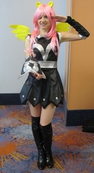 Size: 542x1000 | Tagged: safe, fluttershy, private pansy, human, g4, armor, armor skirt, boots, clothes, cosplay, equestria la, equestria la 2012, irl, irl human, photo, salute, shoes, skirt, solo