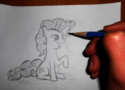 Size: 1500x1077 | Tagged: safe, artist:7yashka7, pinkie pie, g4, cute, drawn into existence, hand, happy, open mouth, pencil, photo, raised hoof, sitting, sketch, smiling