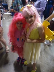 Size: 960x1280 | Tagged: safe, fluttershy, pinkie pie, human, g4, child, convention, cosplay, fan expo canada, irl, irl human, photo