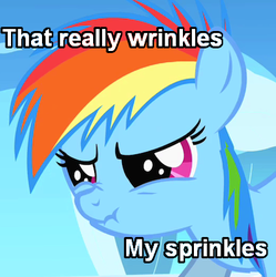 Size: 400x402 | Tagged: safe, edit, edited screencap, screencap, rainbow dash, g4, angry, caption, cute, dashabetes, female, filly, filly rainbow dash, food, glare, image macro, jimmies, meme, nose wrinkle, reaction image, scrunchy face, solo, sprinkles, text, younger