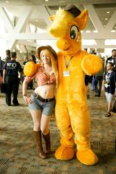 Size: 1935x2903 | Tagged: source needed, safe, applejack, human, bronycon, g4, belly button, clothes, cosplay, daisy dukes, front knot midriff, fursuit, irl, irl human, midriff, photo