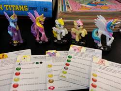 Size: 3264x2448 | Tagged: safe, breezie (g3), princess cadance, princess celestia, princess luna, sunny rays, g4, blind bag, female, heroclix, irl, photo, toy