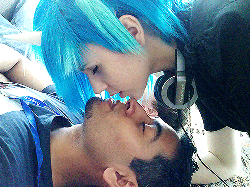 Size: 500x375 | Tagged: dead source, safe, artist:norikat, dj pon-3, vinyl scratch, human, g4, alex s., animated, cosplay, duo, irl, irl human, kiss on the lips, kissing, photo