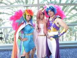 Size: 4608x3456 | Tagged: safe, artist:ladymella, artist:unkcos5, princess cadance, rainbow dash, shining armor, human, g4, armor, clothes, cosplay, dress, gala dress, hand on hip, irl, irl human, photo, wondercon, wondercon 2013