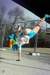 Size: 1067x1600 | Tagged: safe, artist:stunt-sheep, rainbow dash, human, g4, action pose, clothes, cosplay, irl, irl human, photo, rainbow socks, socks, solo, striped socks, thigh highs