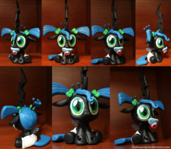 Size: 1024x892 | Tagged: safe, artist:aplexpony, queen chrysalis, changeling, changeling queen, nymph, g4, baby, craft, cute, cutealis, diaper, female, hnnng, irl, pacifier, photo, pigtails, sculpture, solo, younger