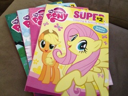 Size: 3264x2448 | Tagged: safe, applejack, fluttershy, g4, book, coloring book, merchandise