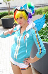 Size: 525x800 | Tagged: safe, artist:burloire, artist:rose0fmay, rainbow dash, human, g4, clothes, cosplay, dragon con, goggles, hand on hip, irl, irl human, peace sign, photo, shorts, solo