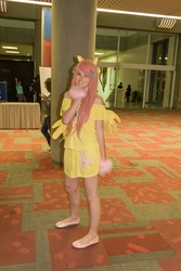 Size: 683x1024 | Tagged: safe, artist:unkcos9, fluttershy, human, g4, clothes, cosplay, fanimecon, flats, irl, irl human, off shoulder, photo, solo