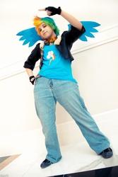 Size: 567x850 | Tagged: safe, artist:residentexorcist, artist:zippyc, rainbow dash, human, g4, bomber jacket, clothes, fingerless gloves, gloves, goggles, irl, irl human, jeans, katsucon, photo, solo