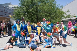 Size: 1080x720 | Tagged: artist needed, safe, rainbow dash, human, g4, clothes, cosplay, fanimecon, group photo, irl, irl human, photo, uniform, wonderbolts, wonderbolts uniform