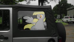 Size: 1280x720 | Tagged: safe, derpy hooves, pegasus, pony, g4, car, cute, decal, female, irl, jeep, mare, photo, solo, tongue out, van, vehicle