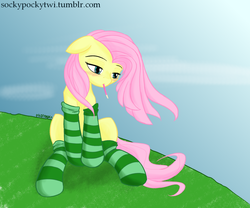 Size: 1200x1000 | Tagged: safe, artist:thattagen, fluttershy, g4, clothes, female, pocky, socks, sockypockytwi, solo, striped socks