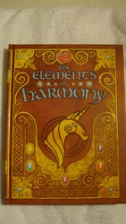 Size: 900x1600 | Tagged: safe, my little pony: the elements of harmony, book, elements of harmony, guidebook, irl, merchandise, photo