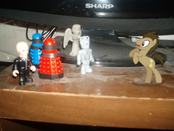Size: 640x480 | Tagged: safe, doctor whooves, time turner, angel, cyberman, g4, dalek, daleks, dust, irl, photo, photography, ponies in real life, silent, toy, weeping, weeping angel, weeping angels
