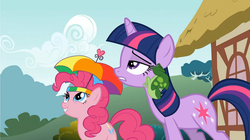 Size: 1054x592 | Tagged: safe, screencap, pinkie pie, twilight sparkle, frog, feeling pinkie keen, g4, cute, frown, grin, gritted teeth, lidded eyes, looking up, smiling, squee, unamused