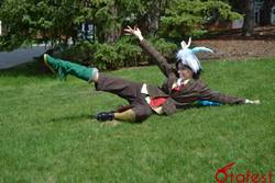 Size: 960x641 | Tagged: safe, artist:jaiharock, discord, human, g4, clothes, cosplay, grass, irl, irl human, otafest, photo, solo, suit