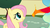 Size: 940x532 | Tagged: safe, screencap, fluttershy, philomena, princess celestia, bird, pegasus, phoenix, pony, a bird in the hoof, g4, duo focus, female, grin, looking up, mare, princess celestia's hair, smiling