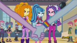 Size: 1623x909 | Tagged: safe, screencap, adagio dazzle, apple bloom, aria blaze, photo finish, pixel pizazz, rainbow dash, scootaloo, sonata dusk, twilight sparkle, violet blurr, equestria girls, g4, my little pony equestria girls: rainbow rocks, boots, female, holding hands, looking at you, out of context, shoes, the dazzlings, the snapshots, twilight sparkle (alicorn), unimpressed